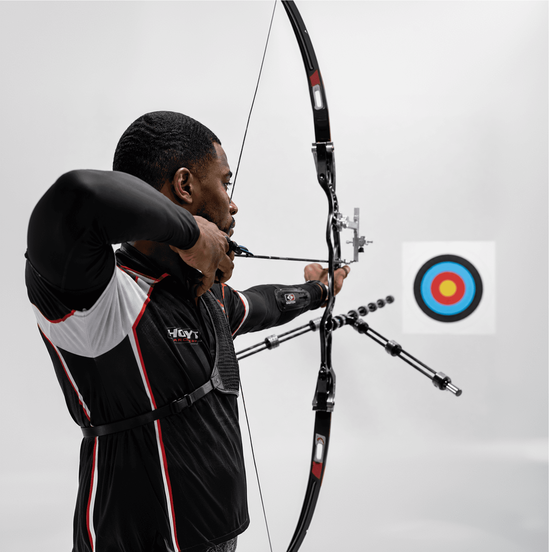 Archer aiming at a target face on the archery field