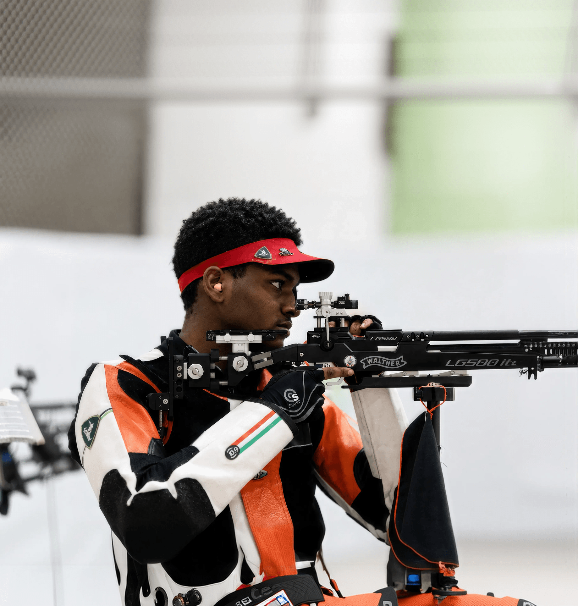 Athlete shooting smallbore rifle under ISSF rules